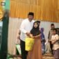 Bupati Sukabumi bersilaturahmi dengan warga Nagrog dalam Muhibah Ramadhan, menegaskan komitmen melayani masyarakat.